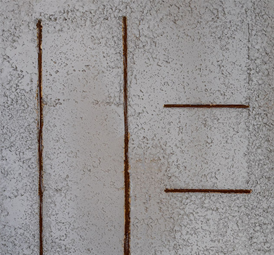Hormigon Picado Chico concrete wall panel with rust bars from Stonini Concrete Range